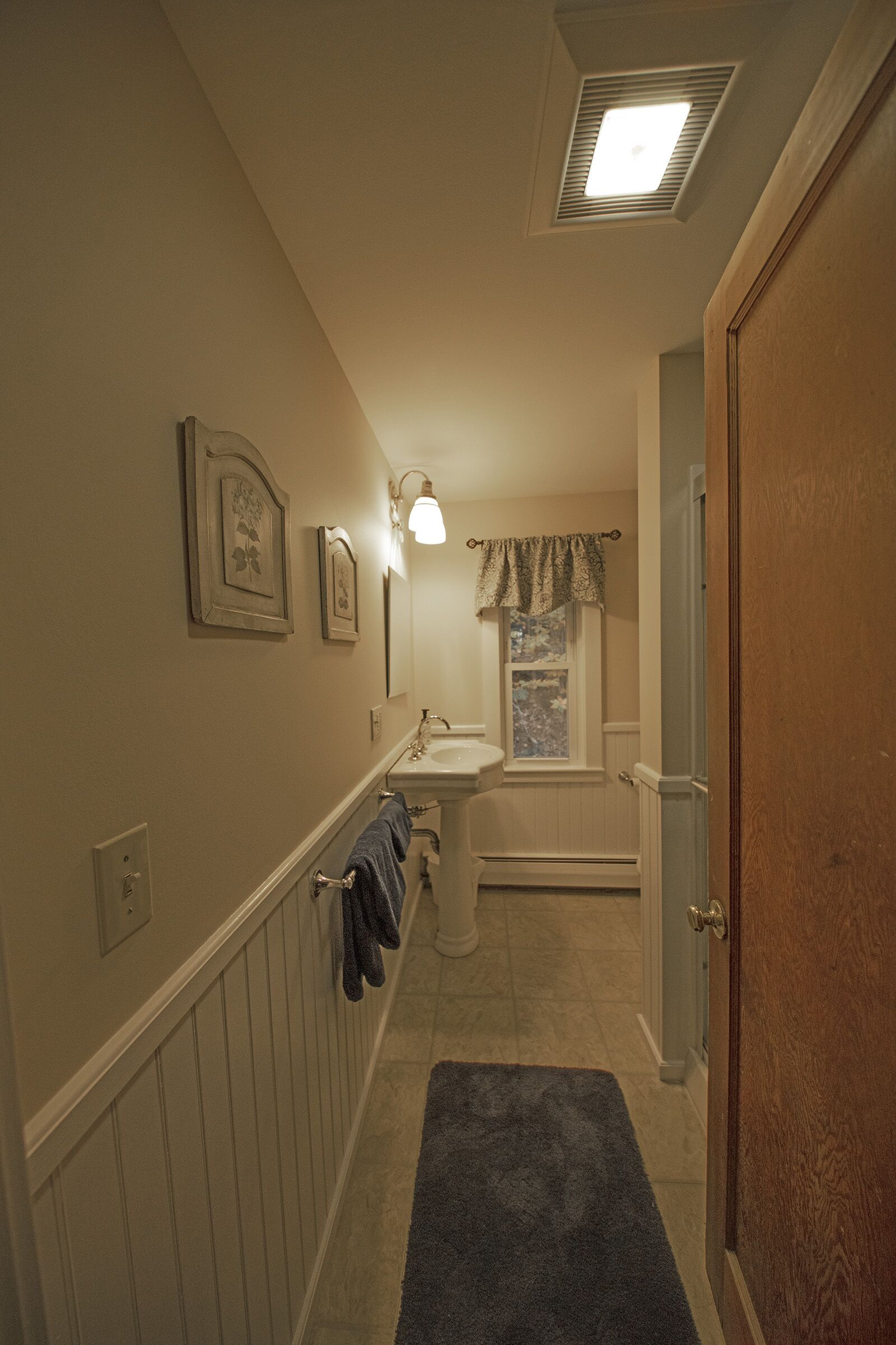 Shower, hair dryer, towels, toilet paper