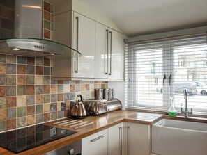 Dishwasher, high chair, cookware/dishes/utensils