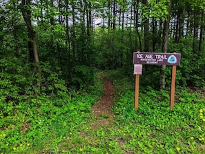 A sign for the Ice Age Trail Whitewater Lake Segment in a forested area. - Whitewater Lake Living - Large Deck - In The Heart of the Kettle Moraine   (Whitewater)