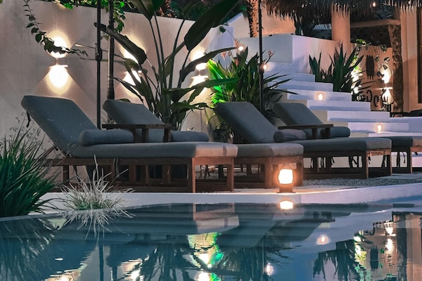 Outdoor pool, pool umbrellas, sun loungers