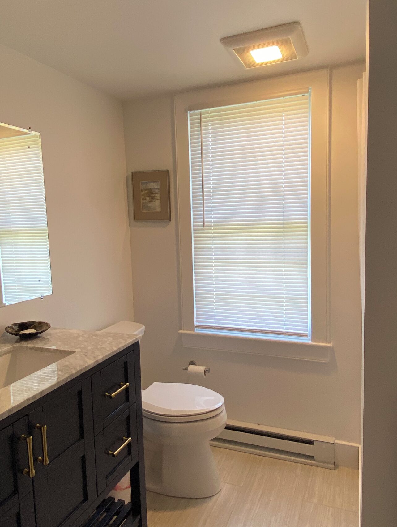 Combined shower/tub, hair dryer, towels, soap