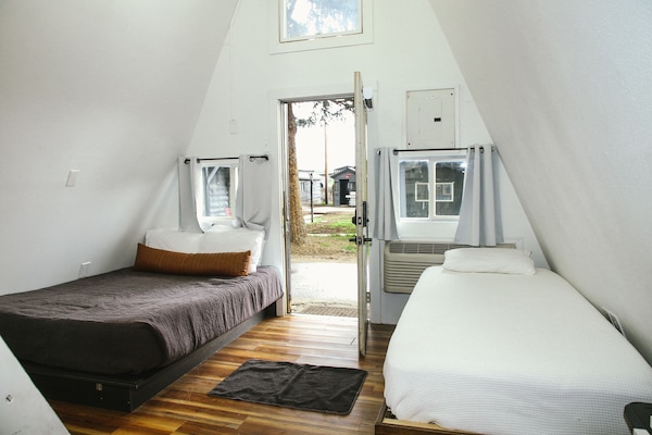 Desk, laptop workspace, blackout curtains, free WiFi