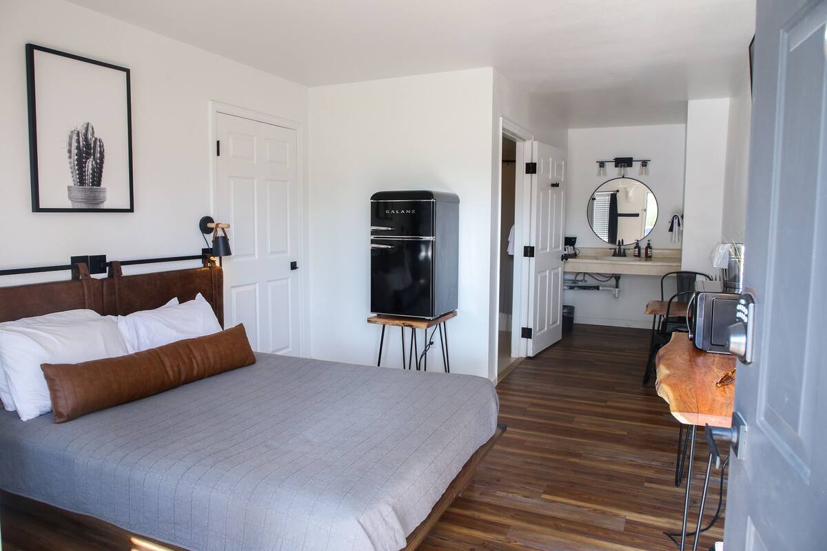 ADA Standard Queen Main Level | Desk, laptop workspace, blackout drapes, WiFi (free)