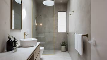 Bathtub, hair dryer, towels, soap