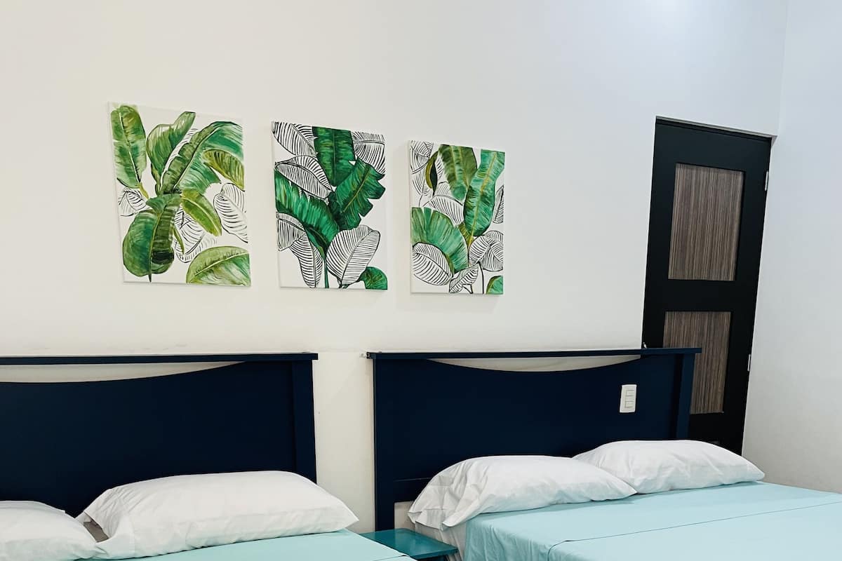 Desk, laptop workspace, free WiFi, bed sheets