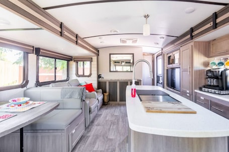 Interior. Riverside Romance/Luxury RV/Starry Skies & S'mores