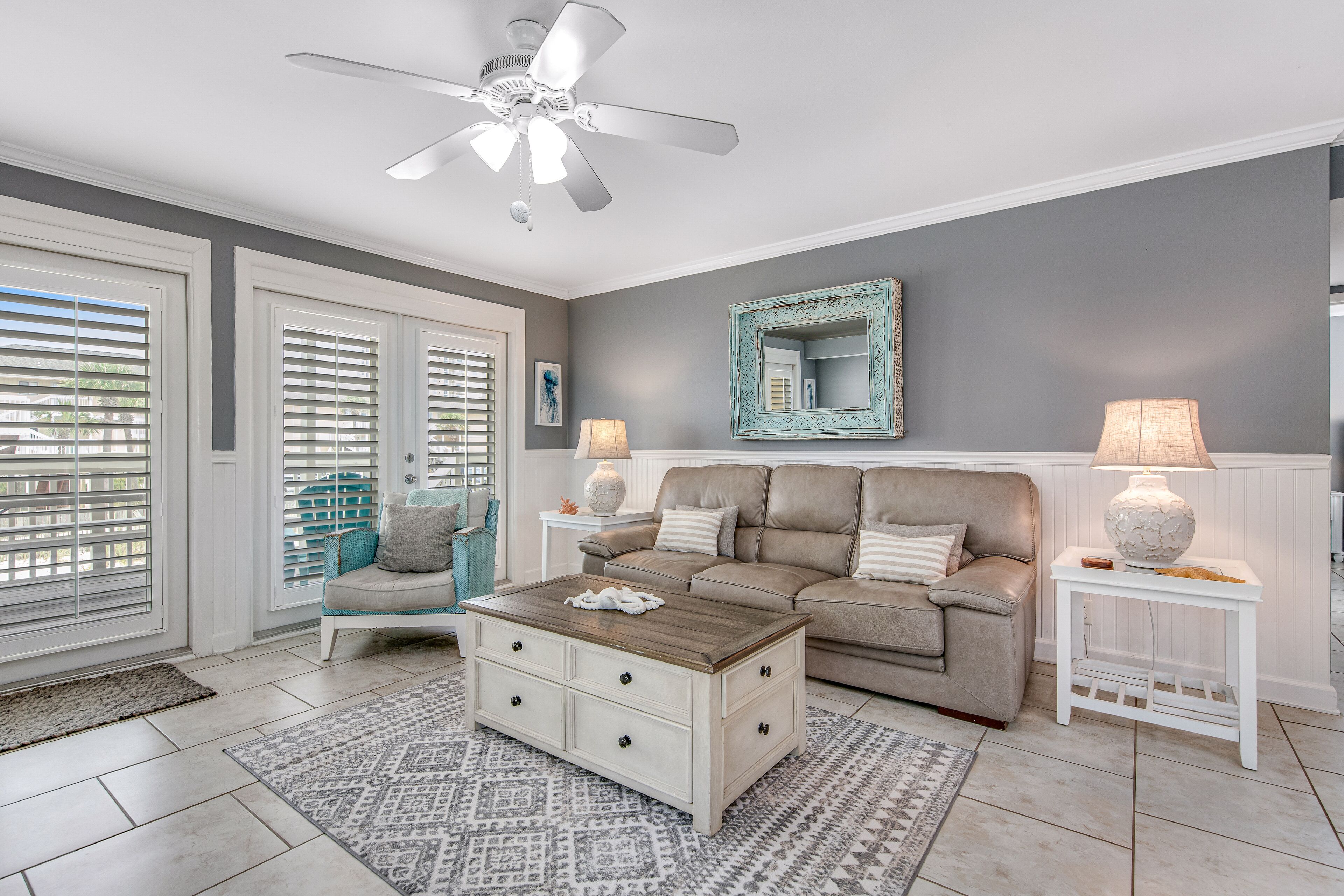 Stylish waterfront condo with pools, hot tubs, private beach, & sports courts