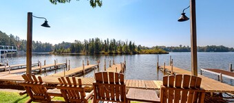 Lakefront resort retreat with screened porch, fireplace, pool, marina, & dining
