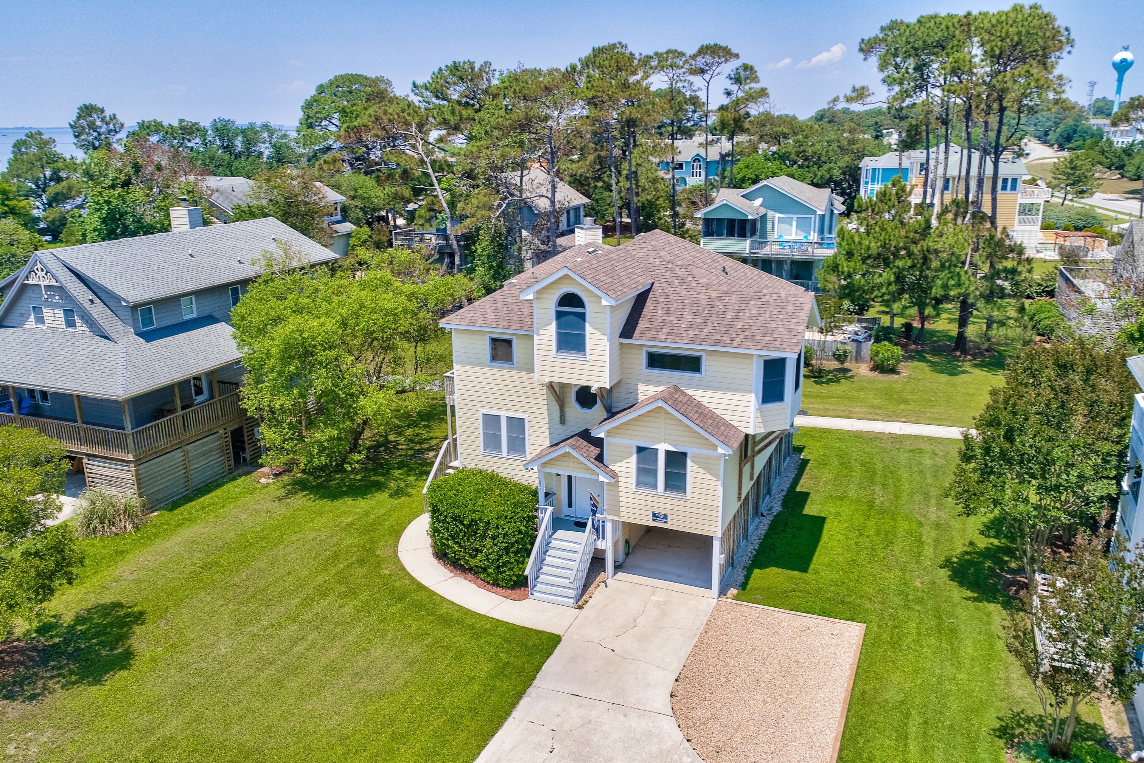 Sound-view home near the beach with private hot tub, pools, gym, & tennis