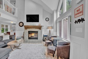 Smart TV, fireplace, foosball