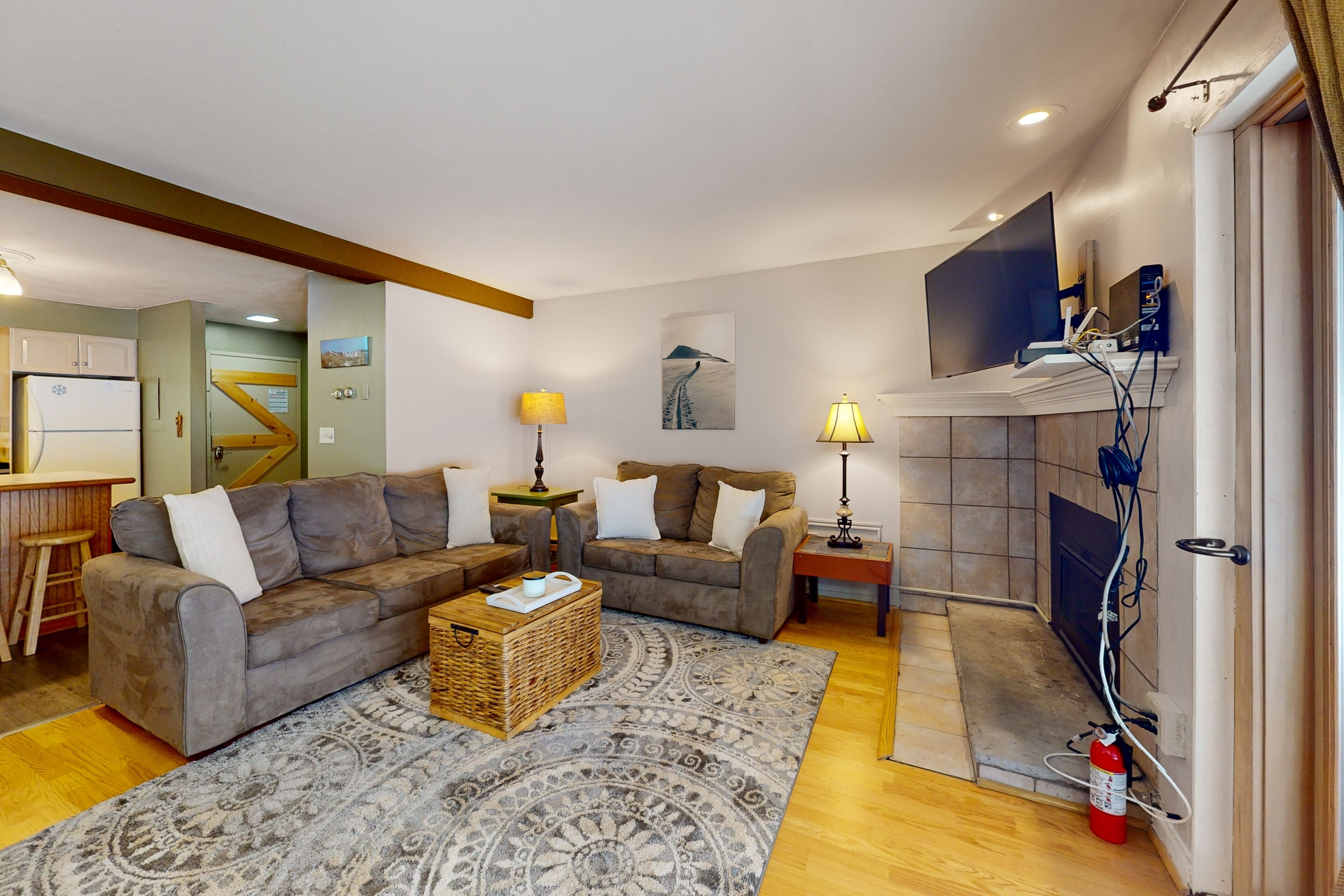 Secluded home with gas fireplace, patio, pool, athletic courts, & laundry room