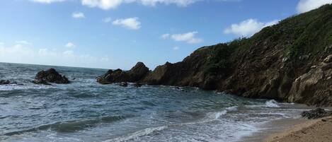 On the beach, sun loungers