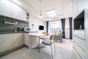 Studio W | Private kitchen | Fridge, microwave, coffee/tea maker, electric kettle - Urbanstay Songdo Moonlight Park (Incheon)