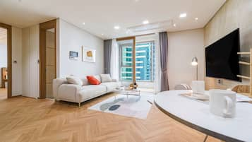 Suite Premium, habitaciones conectadas | Ropa de cama de alta calidad y camas con efecto memoria 