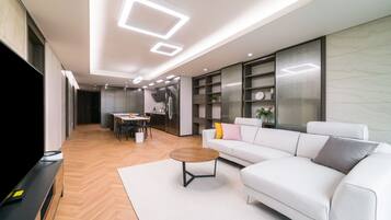 65-inch Smart TV with digital channels, heated floors