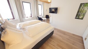 Literie hypoallergénique, couette en duvet d'oie