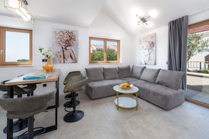 Family Apartment, 3 Bedrooms, Sea View | Living area | 40-inch LCD TV with cable channels, TV - Casa Laurea (Dubrovnik)