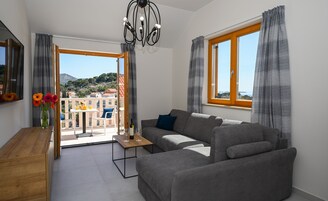 Appartamento Premium, 1 camera da letto, vista mare | Soggiorno | TV LCD 40 pollici con canali via cavo, TV