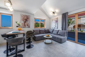 Family Apartment, 3 Bedrooms, Sea View | Living area | 40-inch LCD TV with cable channels, TV - Casa Laurea (Dubrovnik)