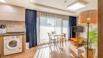 Premier suite, op de hoek | Luxe beddengoed, bedden met traagschuimmatras, verduisterende gordijnen