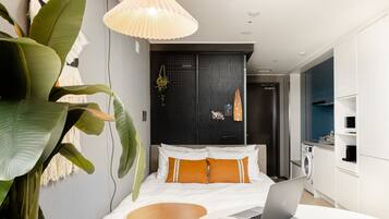 Premium bedding, memory-foam beds, blackout curtains, free WiFi