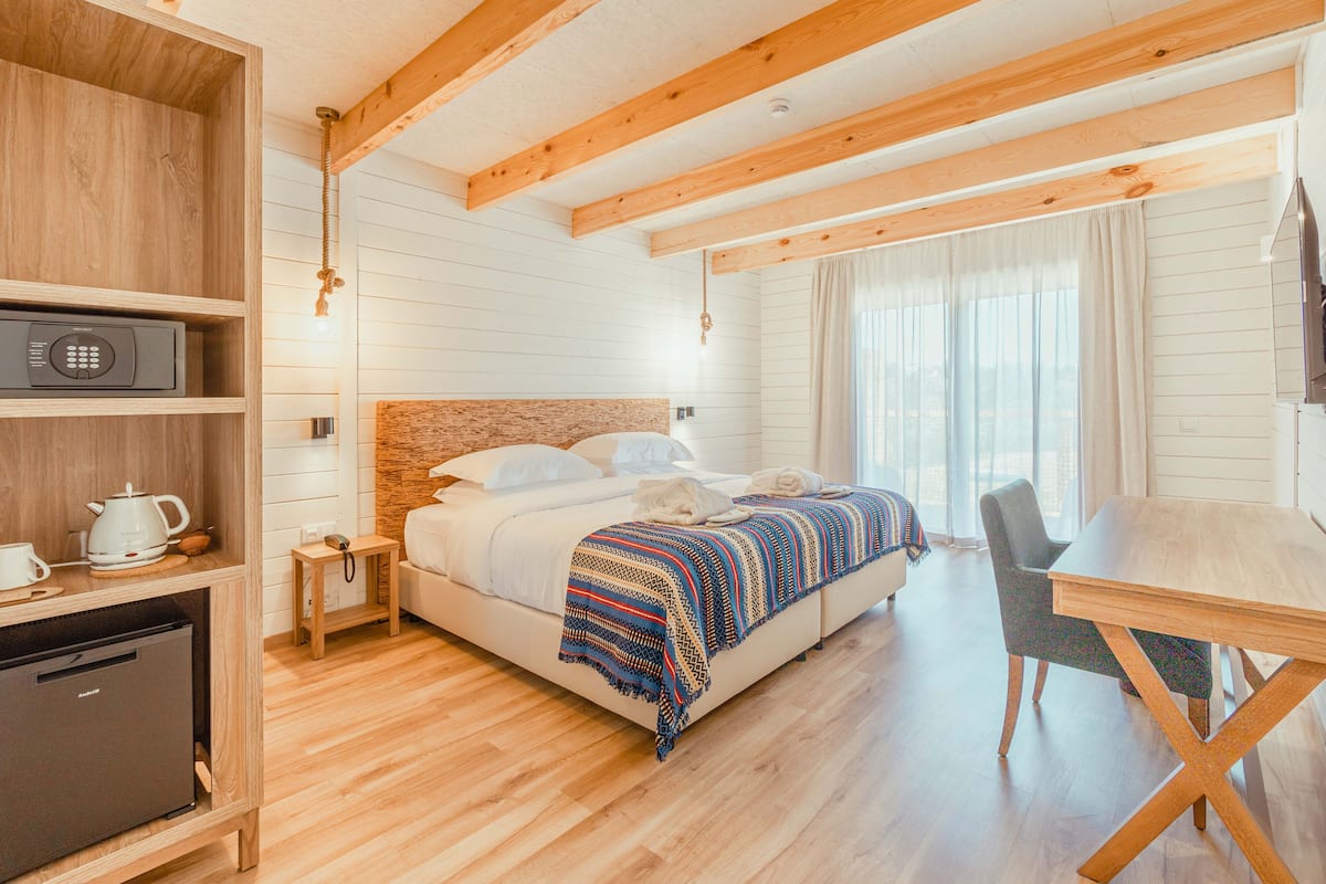 traditional double or twin room | 1 bedroom, minibar, in-room safe, individually decorated