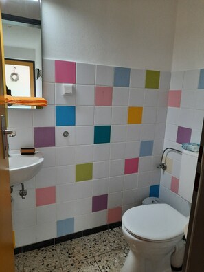 Dutxa, assecador de cabells, tovalloles i sabó 