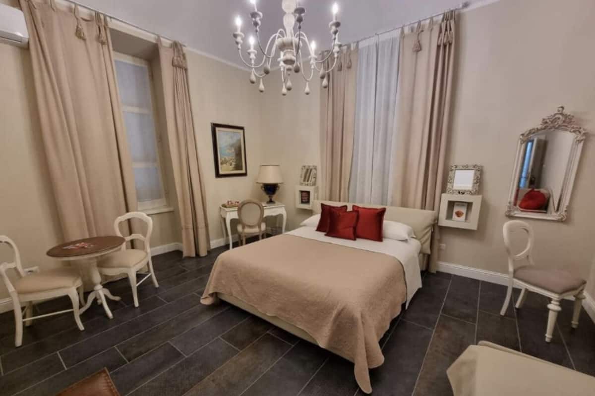 Habitación cuádruple Deluxe | Wifi gratis y ropa de cama