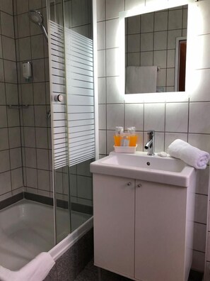 Hair dryer, towels, soap, shampoo