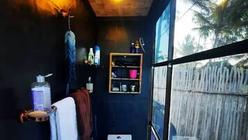 Shower, towels, soap, toilet paper