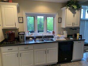 Coffee/tea maker, fridge, microwave, oven