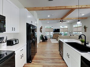 Fridge, microwave, oven, stovetop - Lush Pet-Friendly Home, Near Beach with Golf Cart, 4 Bikes (Santa Rosa Beach)