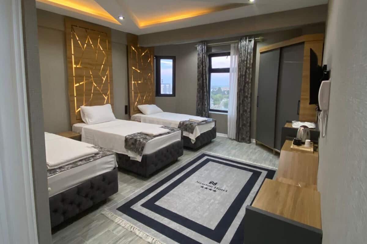 Elite Triple Room | 1 bedroom, individually decorated, individually furnished, desk