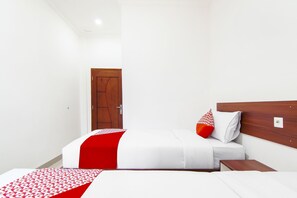 Chambre Deluxe avec lits jumeaux | Bureau, espace de travail pour ordinateurs portables