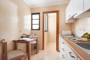 Fridge, microwave, electric kettle, toaster