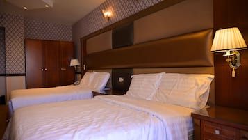 Suite ejecutiva | 2 habitaciones, tabla de planchar con plancha y wifi gratis