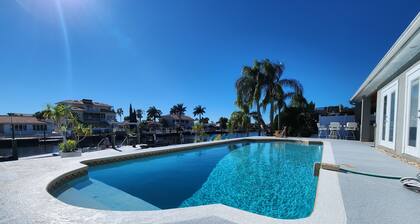 Outdoor lovers dream home- Pool, outdoor kitchen, private dock, and so much more