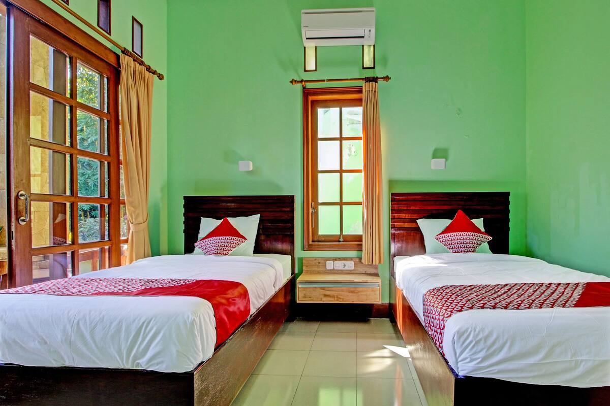 Habitación superior con 2 camas individuales | Wifi gratis y ropa de cama