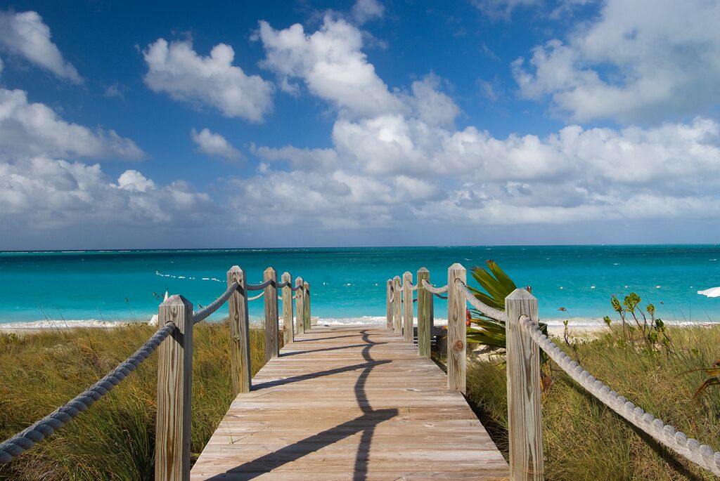 On the beach, sun loungers, beach towels