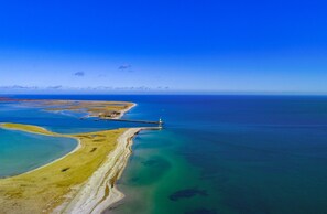 Beach nearby - "BeachTerraceFour" vacation apartment on the beach with sun terrace, sauna & sea view (Olpenitz)