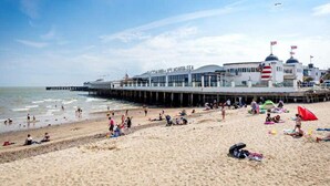 A beach with a pier and a building labeled "North Sea". - Lodge - Sleeps 8 - Parking, Wifi, (Clacton-on-Sea)