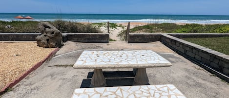 On the beach, sun-loungers, beach towels