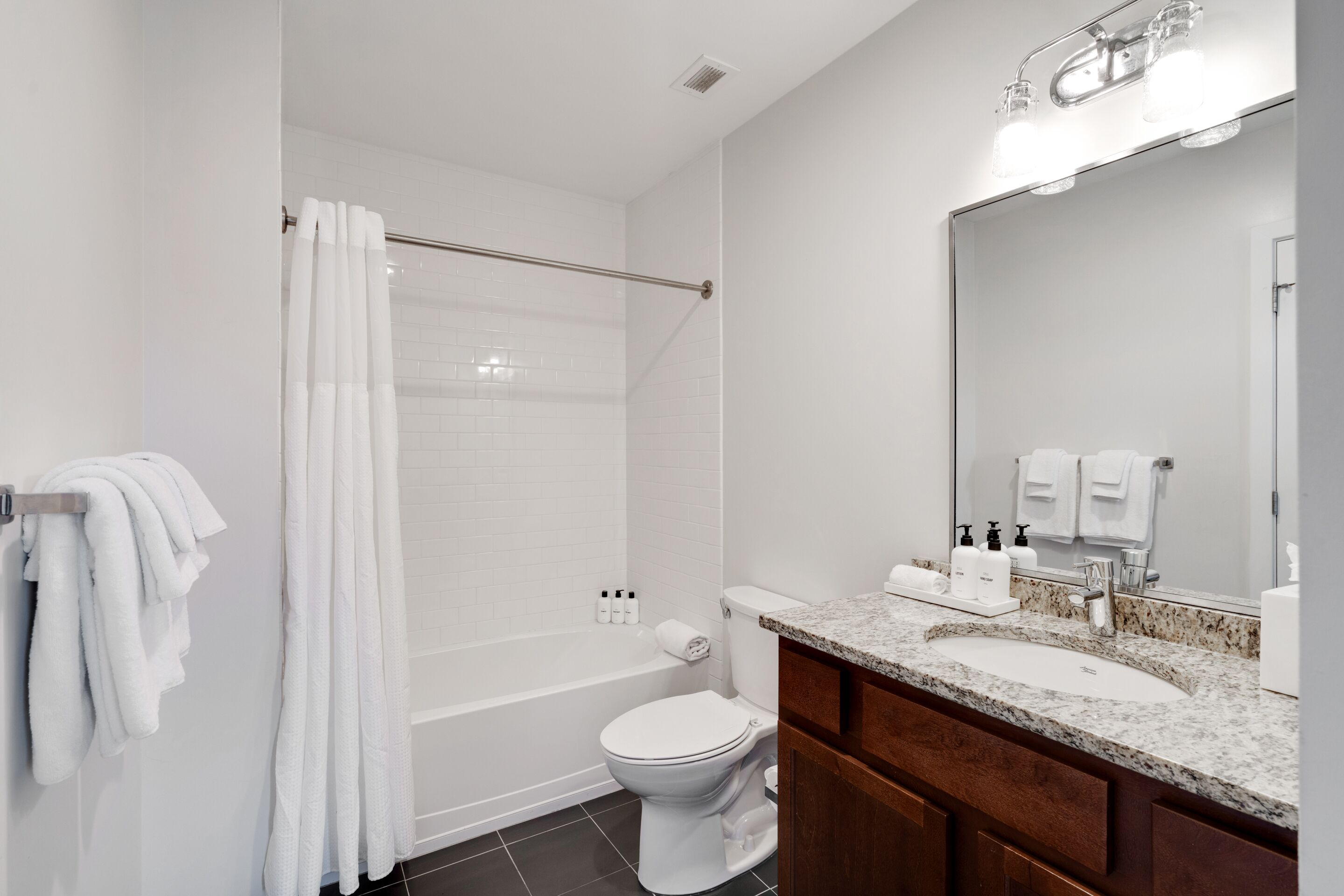 suite, 1 bedroom, city view | bathroom | combined shower/bathtub, hair dryer, towels, soap