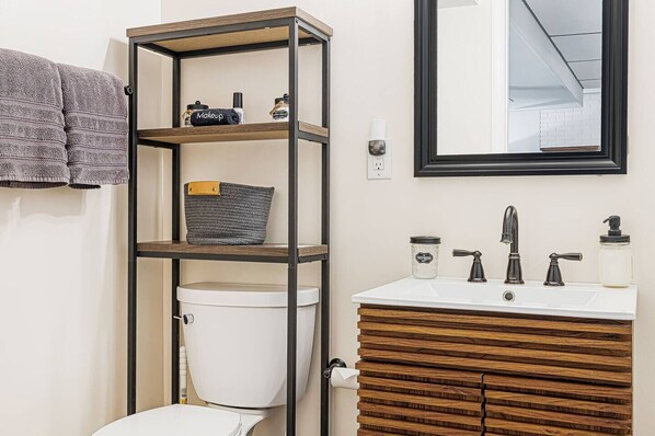 We have your basic bathroom amenities including shampoo, conditioner, shower gel, cotton balls and qtips!