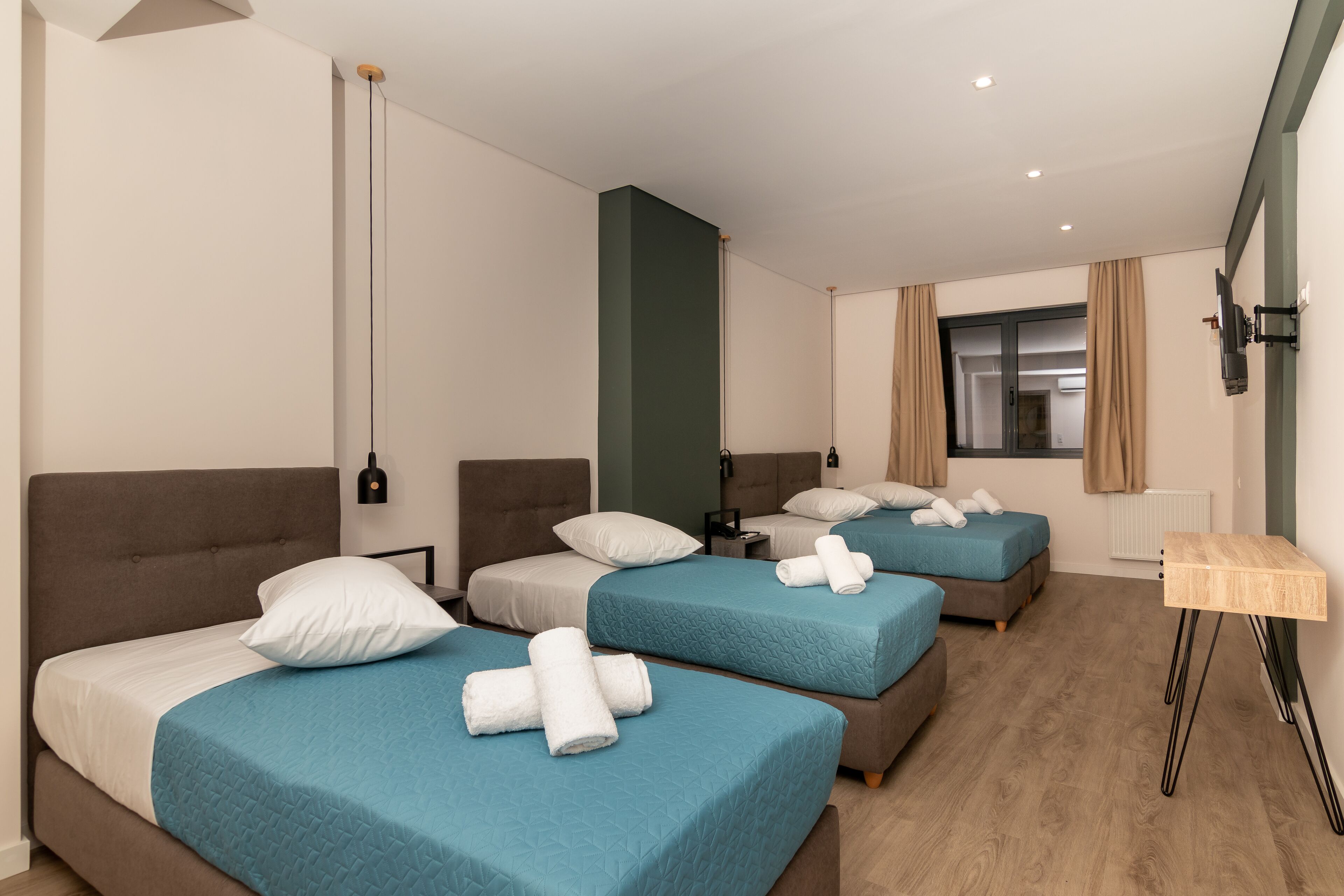 comfort quadruple room | in-room safe, desk, laptop workspace, soundproofing