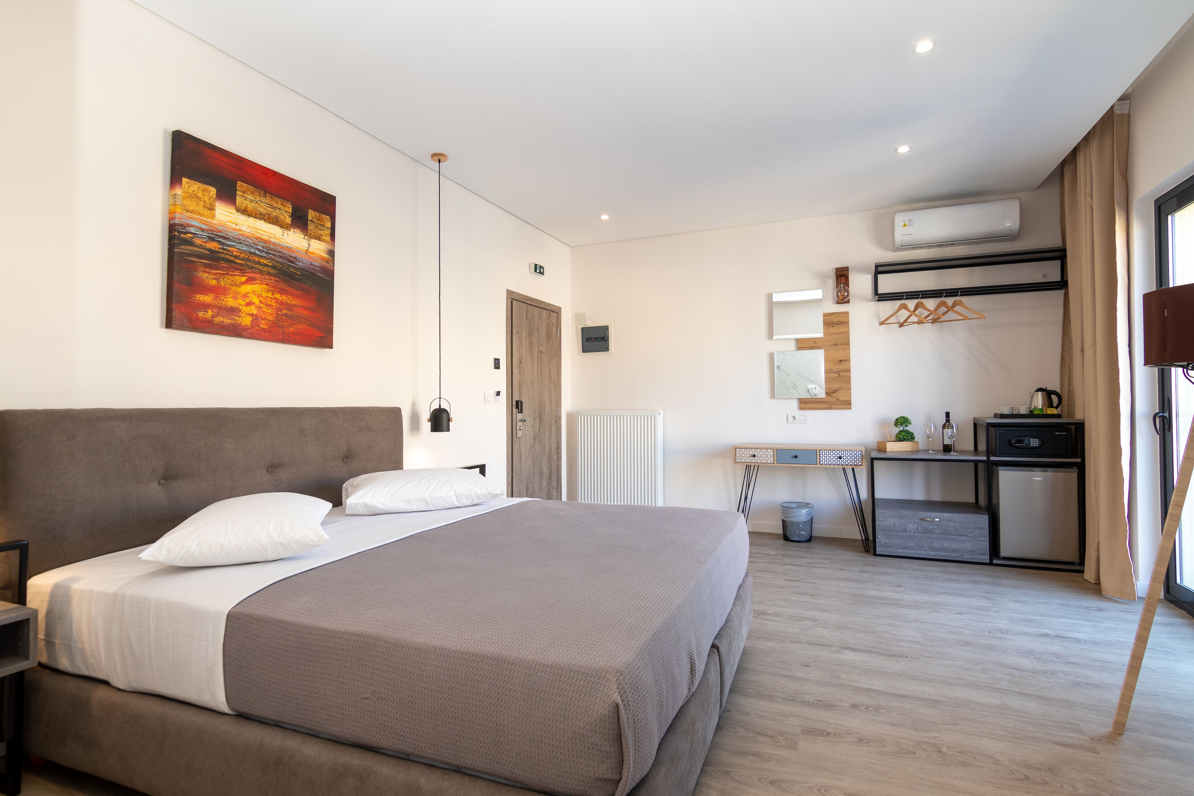 luxury double room | in-room safe, desk, laptop workspace, soundproofing