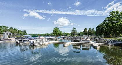 Laid-back lake house with porch, deck, grill, firepit, game room, AC, & W/D