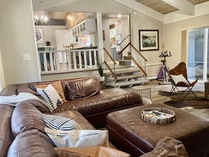 Smart TV, fireplace, table football, books
