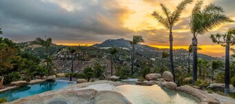 Castle on a hill, breathtaking views, surrounded with pools, trees, and lawn