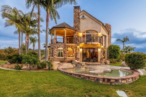 Castle on a hill, breathtaking views, surrounded with pools, trees, and lawn